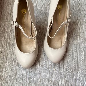 Light brown, size 7 1/2, used one time, not damage